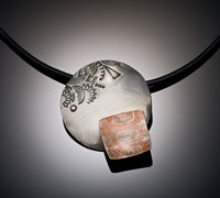 A Disk with a Square Pendant