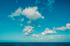 Clouds Over Sea, Hawaii by Jed Share (Color Photograph)