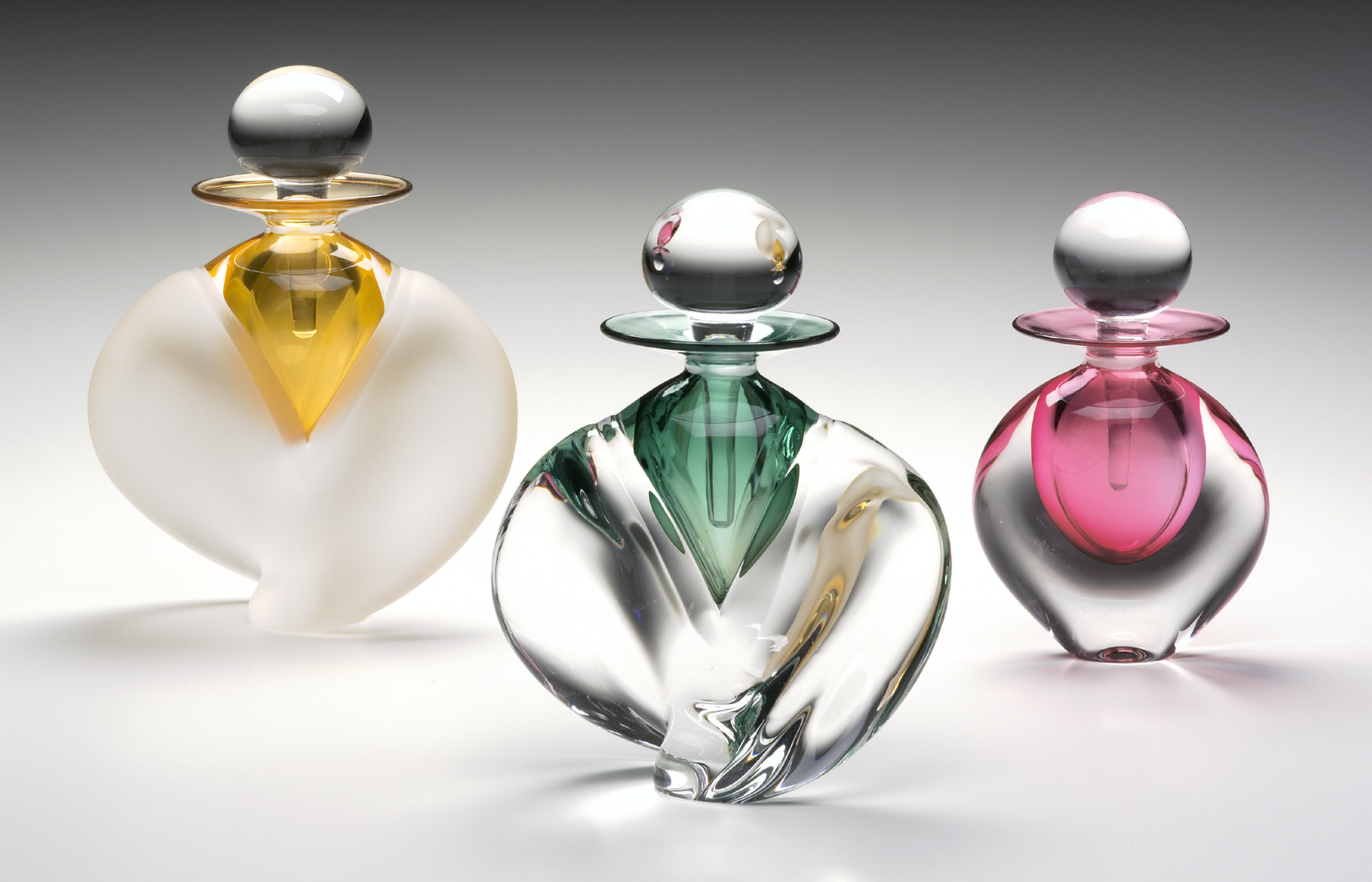 Winged And Flat Perfume Bottles By Michael Trimpol And Monique
