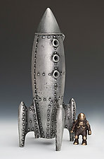 Moon Rocket Coin Bank with Spaceman by Scott Nelles (Metal Bank)