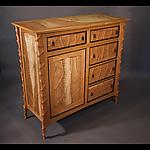 Carved Cherry Case by John Wesley Williams (Wood Cabinet)